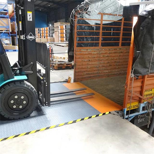 Forklift Roll off Barrier Lip Dock Leveler Gandi Automation.jpg